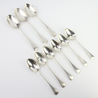 A set of 6 silver dessert spoons London 1913 and 1915 and 3 ditto table spoons, 450 grams 