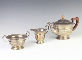 A silver 3 piece tea set with panelled body and beaded decoration Birmingham 1932, gross weight 580 grams 