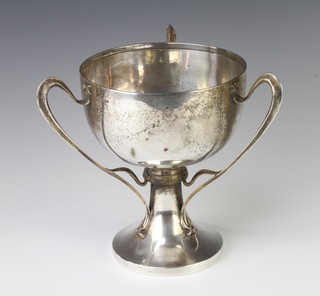 An Arts and Crafts style 3 handled trophy cup, Sheffield 1910, 867 grams, 22cm 