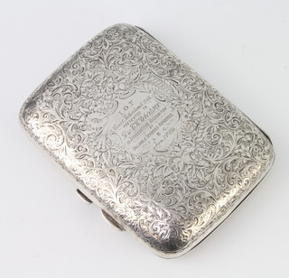 An Edwardian chased silver cigar case with presentation inscription, Birmingham 1902, 121 grams 