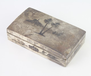 An Egyptian silver and niello rectangular cigarette box decorated with river views, with presentation inscription 16cm 