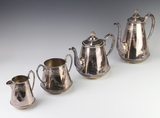 An Edwardian silver plated 4 piece tea and coffee set with chased floral decoration 