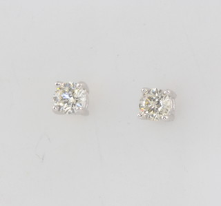A pair of 18ct white gold brilliant cut diamond ear studs approx. 0.65ct