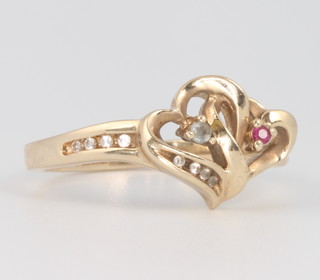 A 10ct yellow gold gem set heart ring, size N 1/2 