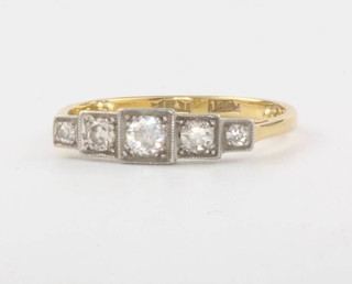 An 18ct yellow gold 5 stone diamond ring size L 