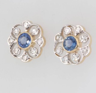 A pair of 18ct yellow gold sapphire and diamond floral ear studs, the diamonds approx. 0.6ct, sapphires 1.25ct, 8mm