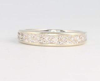 A 9ct white gold diamond set half eternity ring size M 