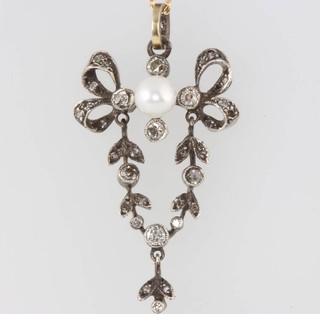 A yellow gold diamond and pearl pendant in the Edwardian style 33mm 
