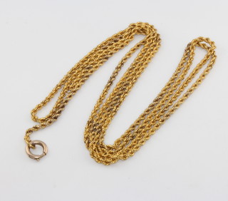 A 15ct yellow gold rope twist muff chain, 23 grams 