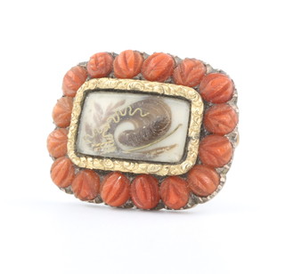 A 19th Century gold and coral memoriam brooch 