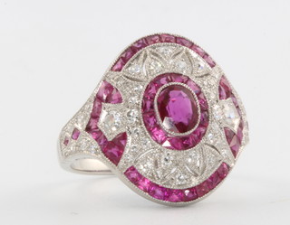A platinum ruby and diamond Art Deco style dress ring, size N, 
