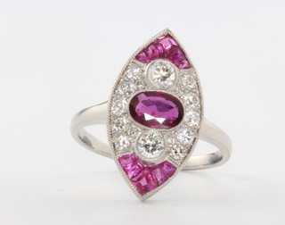 A platinum marquise cut ruby and diamond up finger ring, size n 