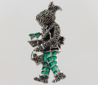 A silver enamel, marcasite and emerald set brooch in the form of a rabbit waiter

