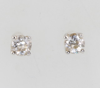 A pair of 18ct white gold single stone diamond ear studs approx. 0.25ct each 
