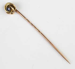 An Edwardian gold tie pin 