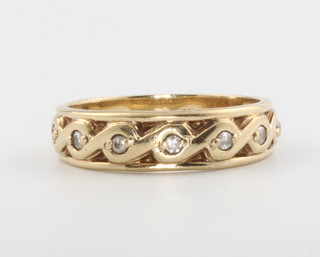 A 9ct yellow gold pierced diamond set ring, size N, 3.2 grams