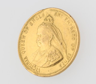 A gilt commemorative coin 1837-1897