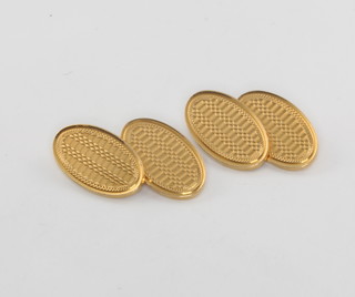 A pair of 18ct yellow gold engine turned cufflinks, 14 grams 