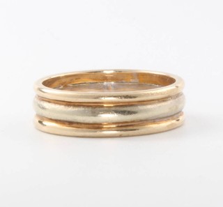 A 9ct three colour gold triple wedding band, size O, 4.9 grams 