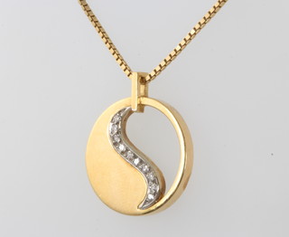 An 18ct yellow gold diamond set pendant and chain 9.3 grams