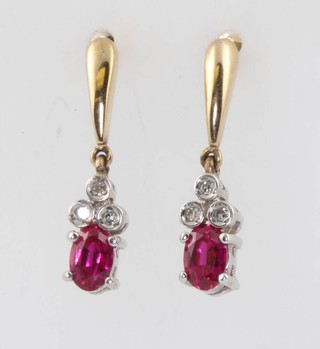 A pair of 9ct yellow gold diamond and gem set earrings, 2.7 grams