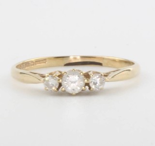A 9ct yellow gold 3 stone diamond ring size L 1/2, 1.1 grams