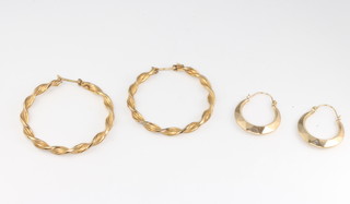 Two pairs of 9ct yellow gold twist hoop earrings, 4.4 grams
