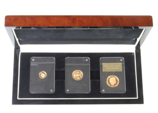 A Battle of The Atlantic gold coin set comprising 2016 sovereign, 2016 half sovereign and 2016 quarter sovereign, no.59/499 
