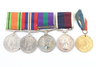 A Second World War medal group to 573359.F.SGT.M.Bird RAF comprising Defence medal, British War medal, General Service medal with Malaya bar and Air Force Long Service Good Conduct medal, in original posting box together with a gilt Coronation medal 