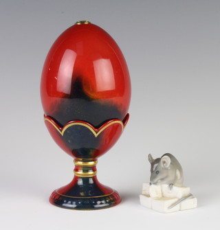 A Royal Doulton flambe egg on stand 13cm together with a Danish figure of a mouse 2.5cm 