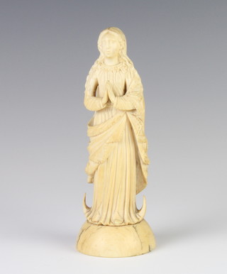 A 19th Century Dieppe ivory figure of a standing lady in supplication 15cm 