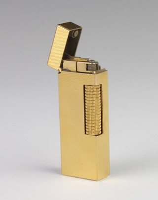 A gentleman's gold plated Dunhill pocket cigarette lighter 