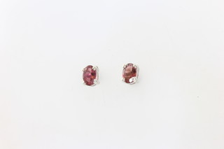 A pair of silver and pink tourmaline ear studs 