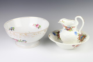 A 19th Century English porcelain pedestal bowl decorated with flowers 29cm, a Coalport miniature jug and bowl decorated with flowers 