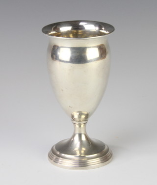 A silver urn shaped vase of plain form, London 1919, 13cm, 130 grams 