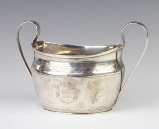 A Georgian silver 2 handled sugar bowl with chased armorial and scroll decoration 18cm, 229 grams