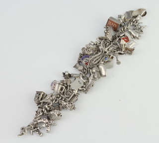 A silver charm bracelet, 143 grams