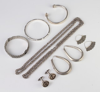 A silver bangle and minor silver jewellery, 238 grams