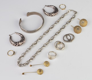 A silver bracelet and minor silver jewellery, 122 grams
