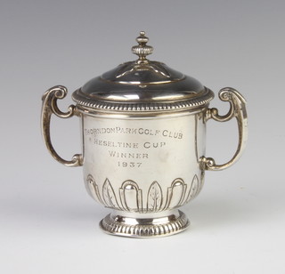 A stylish silver 2 handled trophy and lid, London 1936, 191 grams