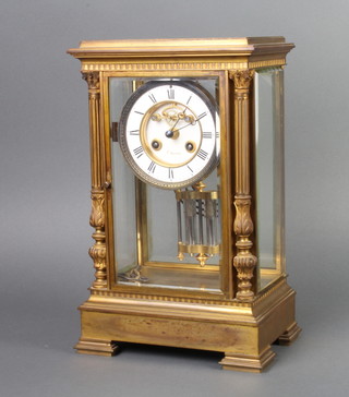 P Buhre, a French 19th Century striking 4 glass clock with visible escapement and Roman numerals with twin mercury pendulum, contained in a gilt case, the back plate numbered and marked 43780 P Buhre, striking on a gong 