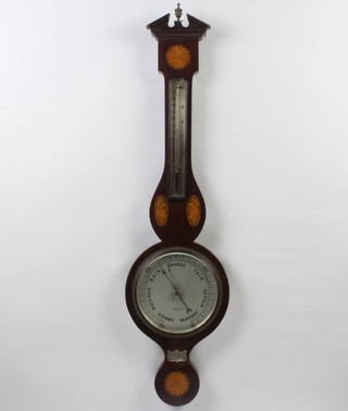 An Edwardian aneroid barometer and thermometer in an inlaid mahogany case, the silvered dial marked Fattorini and Sons of Bradford 