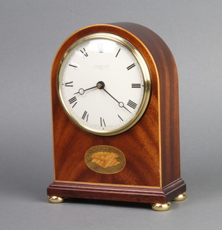 Committi, an Edwardian style timepiece with paper dial and Roman numerals, contained in an arch shaped inlaid mahogany case, with quartz movement 