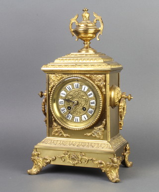 Japy Freres, a French 19th Century 8 day striking mantel clock with Roman numerals, striking on a gong, contained in a gilt metal case surmounted by a lidded urn, the back plate with Japy Freres cypher mark 