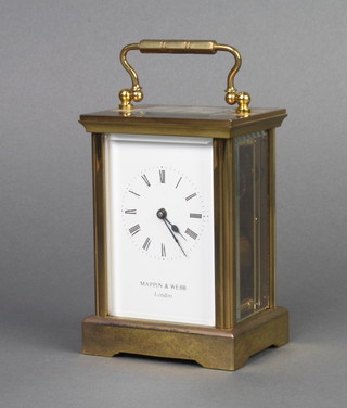 Mappin and Webb, a 20th Century carriage timepiece with enamelled dial and Roman numerals contained in a gilt metal case 