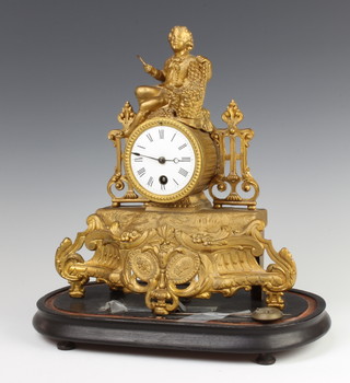 A Victorian French timepiece with enamelled dial contained in a gilt painted spelter case surmounted by a figure depicting the harvest, the back plate marked 1259, complete with pendulum and key 