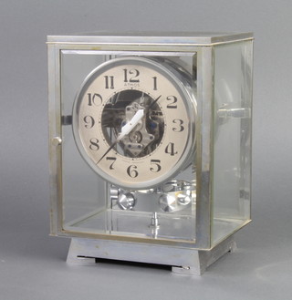 A 1930's Atmos clock, contained in a chrome case, numbered 4390, Brevets J.L Reutter S.G.D.G 24cm h x 27cm w x 14cm d 
