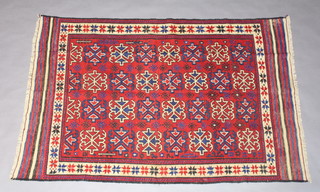 A white, blue and red ground Gulberjasta rug with stylised medallions to the centre within a multi row border 211cm x 141cm 