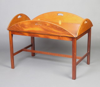A Georgian style mahogany drop flap Butler's table with detachable tray raised on square tapered supports united by an H framed stretcher 54cm h x 93cm w x 64cm d 