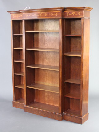 A 19th Century style inlaid mahogany breakfront bookcase with moulded cornice, fitted adjustable shelves, raised on a platform base 189cm h x 164cm w x 39cm d 